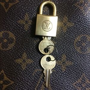 Authentic Louis Vuitton lock and key set